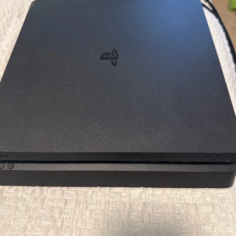 PS4 Sony Gaming Console with one controller- Sleek Black Design